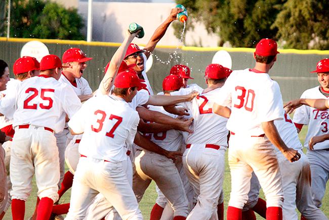 T-Birds celebrate their 13th inning win (Photo by Jacob Dewald)