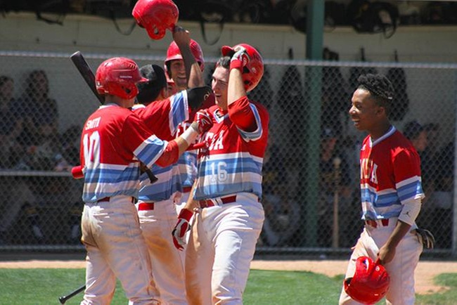 Kody Funderburk gets a hero's welcome after hitting his second grand slam of the season. (Photo by Aaron Webster)