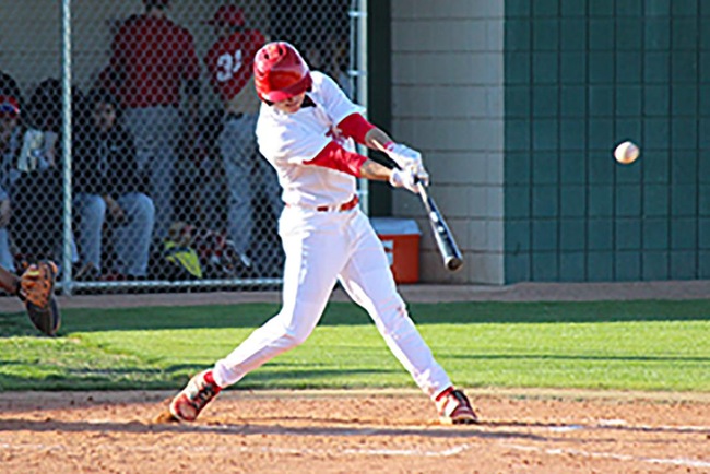 Drew Bailey hits a double to right field to score one of Mesa's six run's on the afternoon. (photo by Aaron Webster)