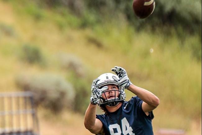 Ethan Cortazzo hauls in a pass during the first week of football practice at Utah State (photo courtesy of USU)