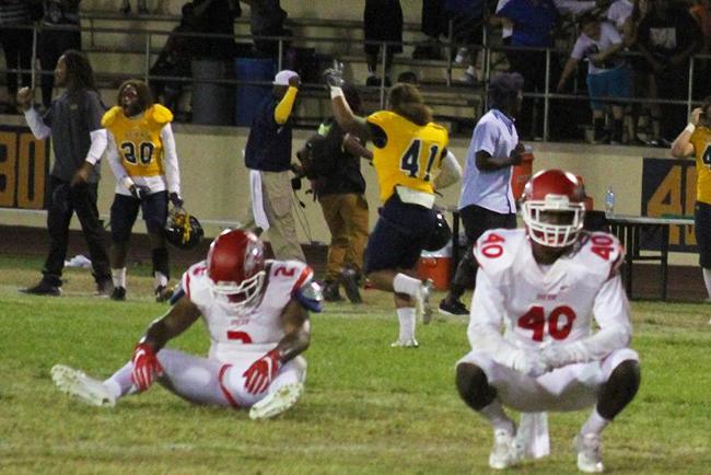 Mesa players are disbelief as Phoenix College wins on a last second touchdown pass to beat the T-Birds Saturday night