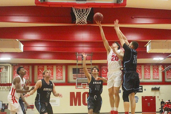 Mesa's Bryce Cheney (#20) finger rolls two of his game high 18 points in the T-Birds win Monday night.