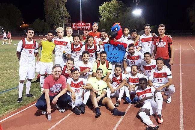 The men's soccer team poses after its 3-0 victory over Paradise Valley.