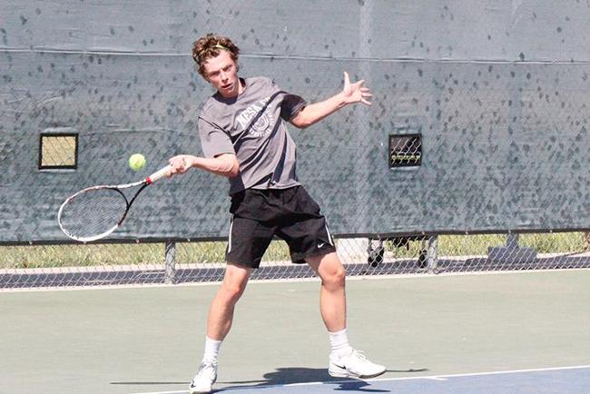 Harry Busby won his first singles match at the NJCAA championship