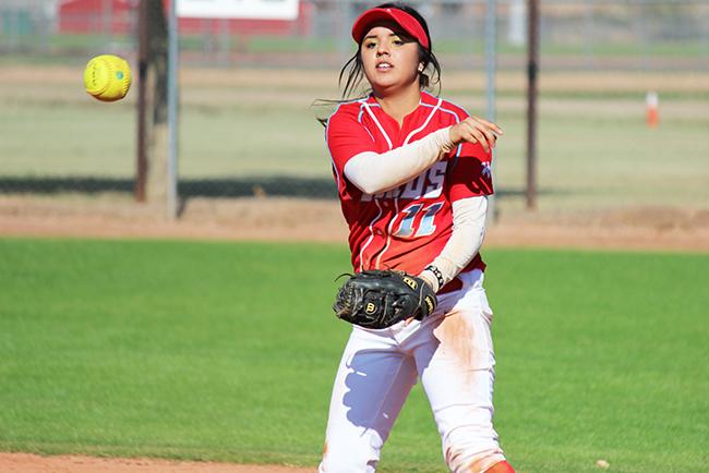 Mariah Gonzales throws out a runner against Phoenix College(photo by Aaron Webster)