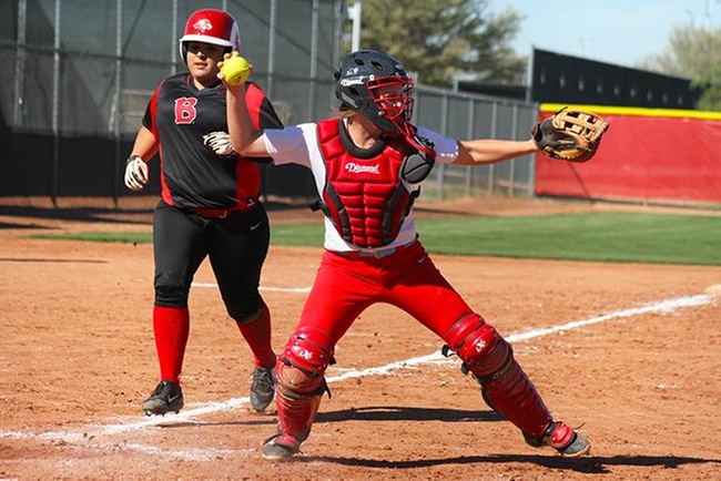 Catcher Tori Gonzalez looks to turn a double play Tuesday against Benedictine JV. (photo by Aaron Webster)