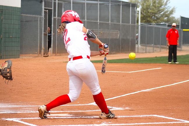 Mesa's Ryann Holmes ropes a double off the right field wall in the first inning of game one Saturday afternoon. (Photo by Aaron Webster)
