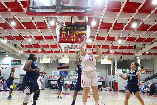 Allies Fuller (#54) powers in a layup in Mesa's victory over Chesapeake Thursday afternoon. (photo by Aaron Webster)