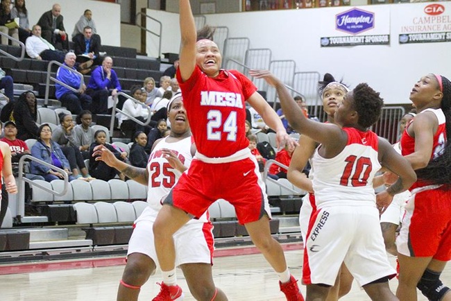 Takara Wade powers to the hole to score two of her career high 22 points against Owens College during the NJCAA National Tournament Thursday night. (Photo by Aaron Webster)