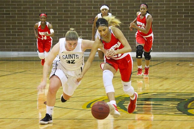 Mesa's Diamond Fuller chases down a loose ball against a Seward County defender. (Photo by Aaron Webster)