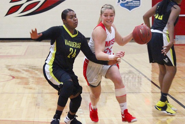 Courtney Colleary drives to the hoop against a Central Arizona defender Wednesday night. (Photo by A-a-ron Webster)