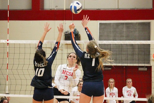Mesa's Lauren Palmer attempts a kill in Friday night's victory over the Pima Aztecs. (Photo by Aaron Webster)