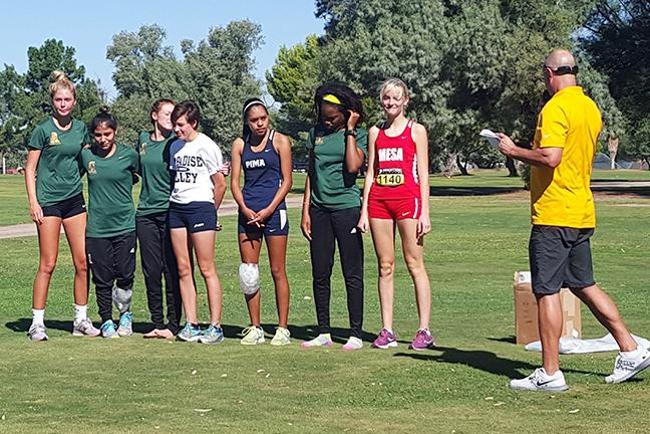 Adeline Montgomery,(far right), finished first in the women's Cross Country ACCAC Championships last Friday down in Tucson, AZ