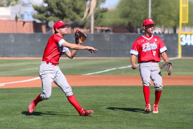 Mesa's Tyler Hilton fields a bunt by a Gaucho player early in Friday's ballgame at Glendale. (Photo by Aaron Webster)