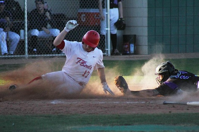 Mesa's Ben Lewis slides in safely past the out stretched arm of the Grand Canyon Club catcher. (Photo by Aaron Webster)