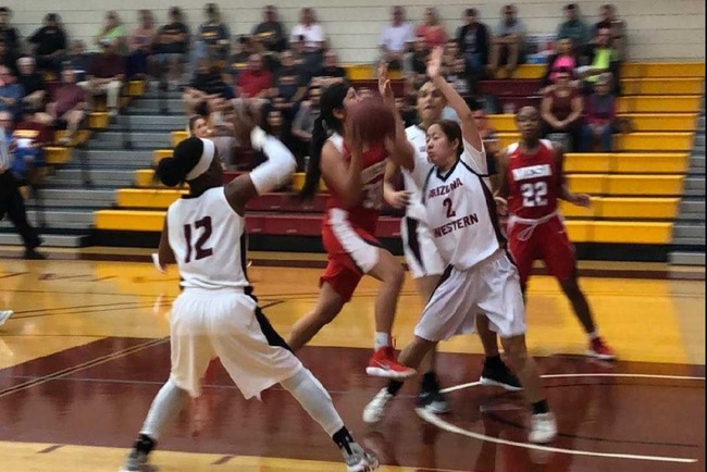Cheyanne Begay drives to the hoop against Arizona Western Wednesday night. (photo by Mard dog)