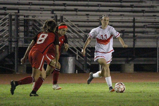Alyssa Felder dribbles up field Thursday night against Cochise College. (Photo by Aaron Webster)