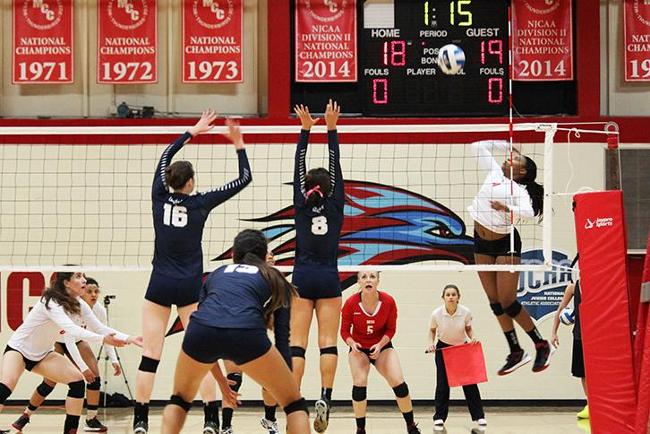 Taylor Whiteside attempts a kill against Pima